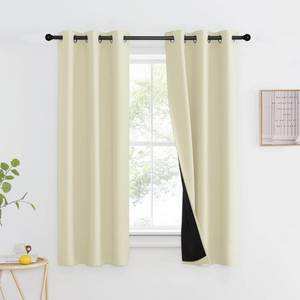 lot 910 image: NICETOWN Living Room Completely Shaded Draperies, Privacy Protection & Noise Reducing Ring Top Drapes, Black Lined Insulated Window Treatment Curtain Panels (Beige, 2 Pieces, W37 x L60) - Retail $34