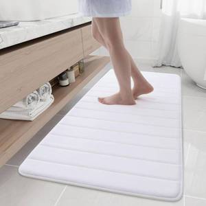 lot 18811 image: Buganda Memory Foam Bath Mat, 60 x 24, Ultra Soft and Non-Slip Bathroom Rugs, Water Absorbent and Machine Washable Bath Rug Runner for Bathroom, Shower, and Tub, White - Retail $36
