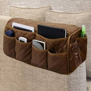 lot 18889 image: MEHIDFY Armchair Caddy, Waterproof Sofa Armrest Organizer, Non Slip Recliner Organizer, Remote Holder for Recline, Recliner Caddy with 14 Pockets Storage for TV Remote, Phone, Magazine (Brown) - Retail $26