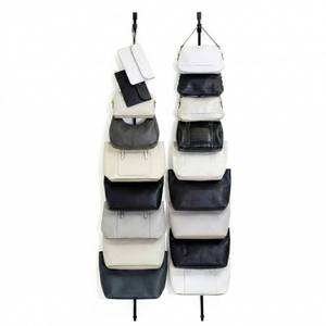 lot 18897 image: Perfect Curve Handbag and Purse Organizer  Hold up to 18 Bags  Over The Door Organizer for Purses and Handbags  Adjustable Clips  2 Straps  Black - Retail $17