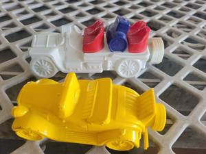 lot 21031 image: Avon Wild Country After Shave Yellow car Bottle. Bottles are EMPTY