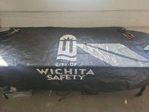 lot 21045 image: City of Wichita Safety hood cover for vehicle while snowing