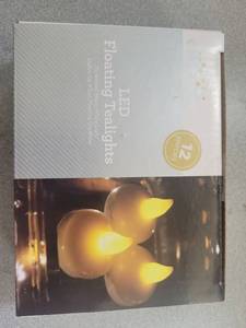 lot 21048 image: LED Floating Tealight Set - 12 Pieces