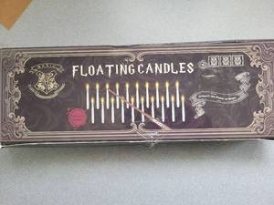 lot 21101 image: Harry Potter Hogwarts Floating Candles with Wand Set