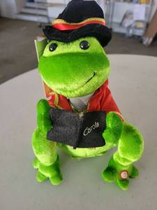 lot 21122 image: Christmas Caroling Frog Plush with Songbook