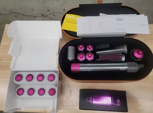 Dyson airwrap complete + volumizing brush + Dyson air wrap display stand