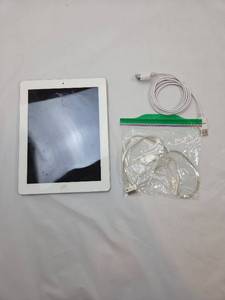 lot 18 image: Apple iPad 2 16GB Wi-Fi White Tablet with Accessories iPad is locked powers on
