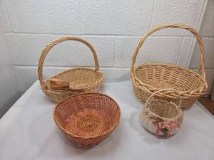 lot 24 image: Wicker Basket Collection with Handles and Decorative Accents