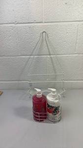 lot 96 image: White Wire Pyramid Soap Dispenser Holder with Holiday Bottles