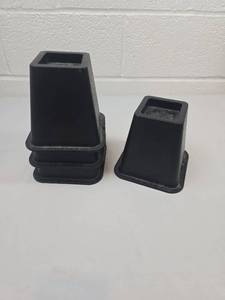 lot 179 image: Black Furniture Risers Set of 4
