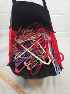 lot 192 image: Tote Bag with Mixed Color Plastic Hangers