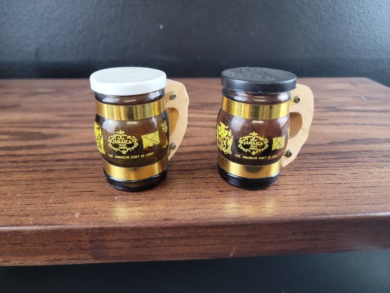 lot 2518 image: Jamaican Coat of Arms Salt & Pepper Shakers