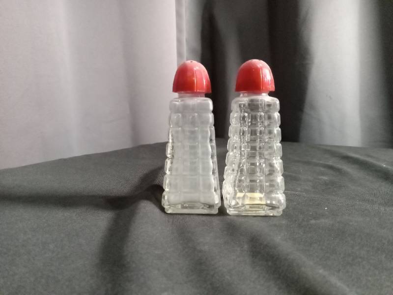 lot 2278 image: Glass Salt and Pepper Shaker Set with Red Caps
