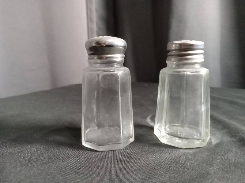 lot 2625 image: Glass Salt and Pepper Shakers with Metal Lids