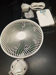 lot 1056 image: LEMOISTAR 8 Inch Small Wall Mounted Fan with Remote Control, 90° Oscillating, 4 Speeds High Velocity, Timer, Adjustable Tilt, 70 Inch Cord, Quiet, for RV Bedroom Home Office Garage-White - Retail $87