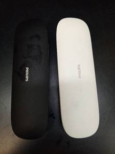 lot 1106 image: Philips Sonicare Electric Toothbrush Set with Travel Cases - Retail $403