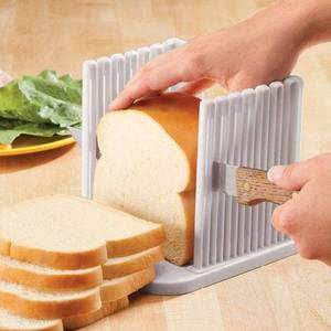 lot 1232 image: Bread Slicer for Homemade Bread, Bread Slicer Guide with AdjustableCrumb Tray, Foldable Compact Plastic Bread Loaf Cutter Slicer for Kitchen Baking Homemade Bread,Cake,Taost,Bagels - Retail $13