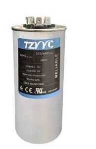 lot 10563 image: 405 MFD 370V or 440V Dual Run Start Round AC Capacitor