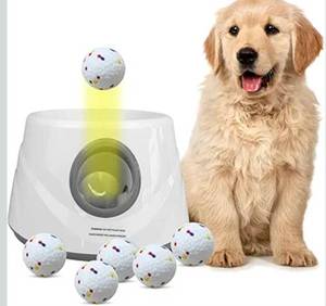 lot 7231 image: Automatic Ball Launcher for Dogs with 6 ETPU Balls, White, Adjustable Distance 20-45ft, USB Rechargeable, Interactive Dog Toy (Gary)