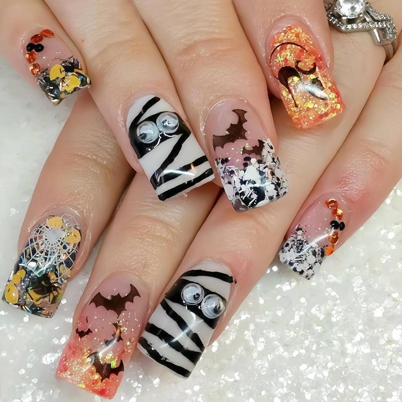 lot 64676 image: Orange Glitter Halloween Press on Nails Short Square Fake Nails Big Eyes Charms Mummy Colorful Sequins Nail Decals Nails Press ons Spider Web Bat Cat False Nails Glue on Nail Stick on Nail for Women