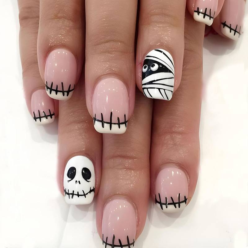 lot 64739 image: Halloween Press on Nails Short Square Fake Nails with Mummy Skeleton Designs White French Tip Nails Press ons Acrylic Stick on Nails for Women 24Pcs