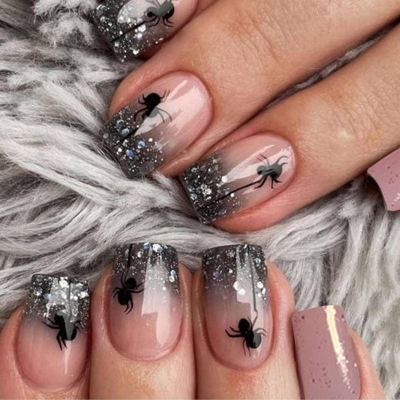 lot 64934 image: Halloween Press on Nails Medium Square Fake Nails with Black Glitter French Tip Spider Designs Acrylic Nails Press ons Glossy False Nials for Women 24 Pcs