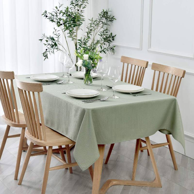 lot 26333 image: Rectangle Textured Tablecloth Waterproof Spill Proof Wrinkle Free Table Cloth, Kitchen Dining Tabletop Decoration, Fabric Table Cover for Outdoor and Indoor Use, 52 x 70 Inch, Sage Green - Retail $10