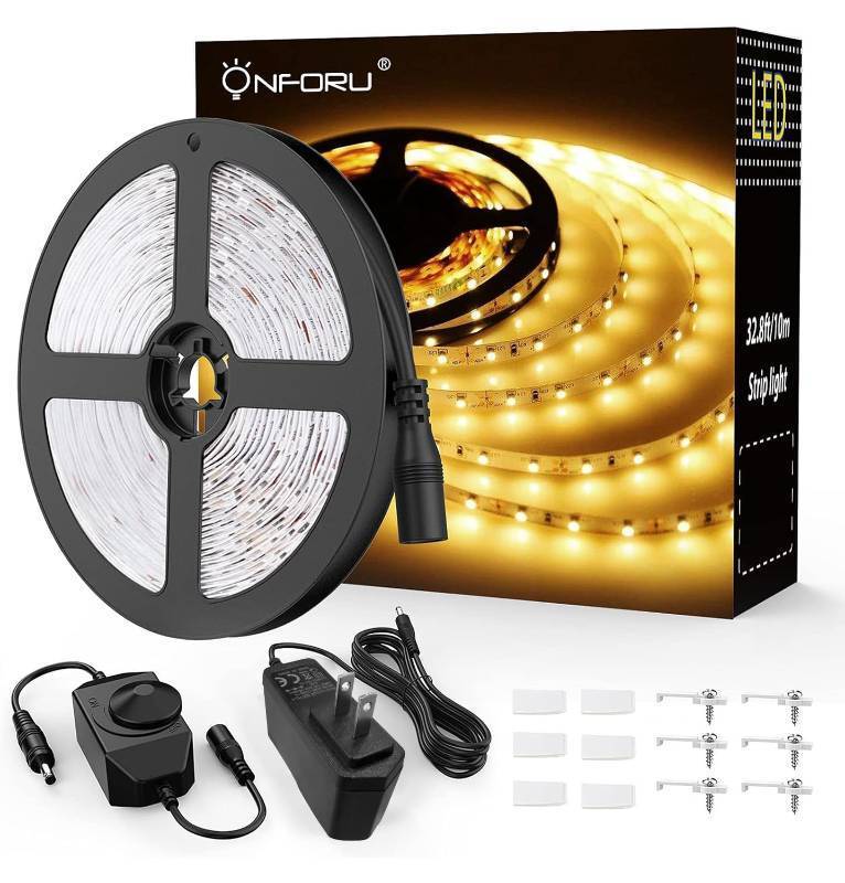 lot 16107 image: LED Strip Lights Warm White,32.8ft Dimmable 3000k Led Lights for Bedroom, Soft White Rope Light,2835 LEDs 12V Flexible Strip Tape Easter Lighting for Under Cabinet, Home, Kitchen, Bedroom, Christmas - Retail $23