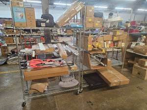 lot 101000 image: Contents of 2 Mystery Carts. Sold As Is. Winner Takes All