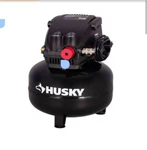 lot 18581 image: Husky3 Gal. 120 PSI Portable Electric Oil-Free Light Duty Pancake Air Compressor with Fold Down Handle and 1-Quick Coupler - Retail $68