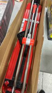 lot 18611 image: Professional Tile Cutter with Measuring Guide - Retail $45