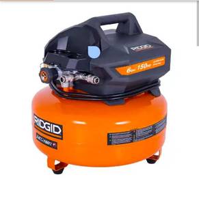 lot 18637 image: RIDGID6 Gal. 150 PSI Portable Electric Oil-Free Jobsite Pancake Air Compressor with Dual Pressure Gauges and 2-Quick Couplers - Retail $119