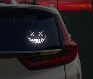 lot 41464 image: Reflective Smile Demon Car Sticker,Funny Cool Die Cut Waterproof Car Window Decal - Retail $6