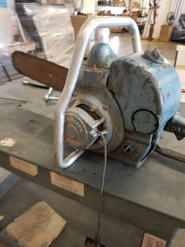 lot 7659 image: Vintage Homelite Zip Chainsaw