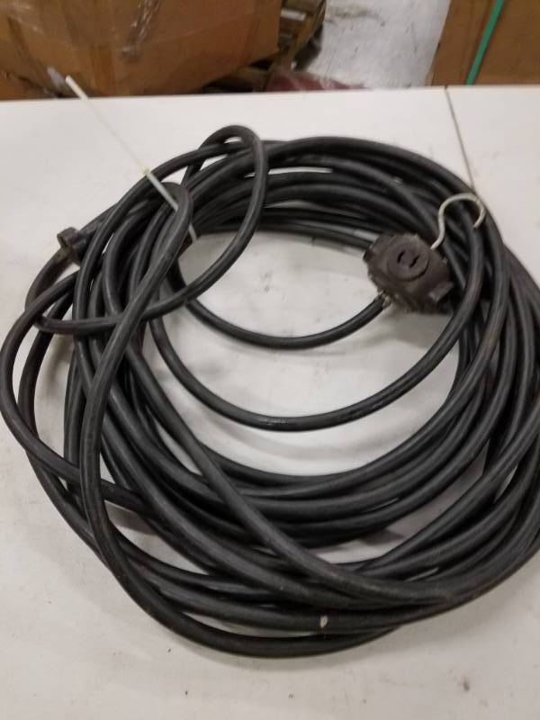lot 7813 image: Heavy Duty 4-way extension cord