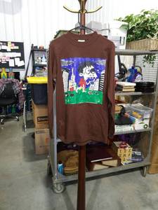 lot 1067 image: SHAKA Wear Brown Long Sleeve T-Shirt with Cartoon Character Graphic Size Small