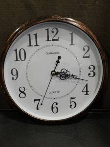 lot 1095 image: Changsheng Round Wall Clock with Brown Wood Frame