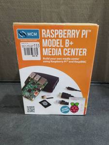 lot 1111 image: Raspberry Pi Model B Media Center Kit Sealed