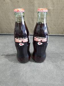 lot 1126 image: Kansas City Chiefs World Champions Coca-Cola Bottles Set of 2