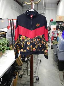 lot 1241 image: Nike Floral Color Block Track Jacket Size Medium
