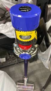 lot 77 image: Dyson v10 Cordless Stick Vacuum Cleaner USED