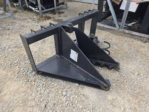 lot 2396 image: Unused JCT Hydraulic Skid Steer Tree Puller Attachment