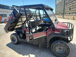 lot 13 image: Kawasaki Mule Pro DX EPS  4X4 Utility Vehicle with Dump Bed