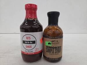 lot 11094 image: RJs Bob-Be-Que Shack Hot Sauce and Traeger Smoked Simple Syrup Set