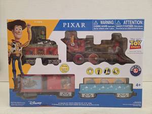 lot 11184 image: Lionel Disney Toy Story Battery-Operated Ready to Play Train Set with Remote
