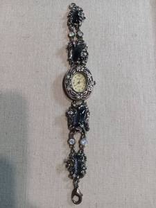 lot 3499 image: Womens Ornate Silver Tone Bracelet Watch with Black Stones