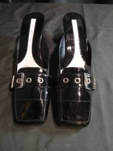 lot 3451 image: Via Spiga Black Patent Leather Mules with Buckle Detail