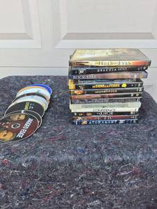 lot 209 image: DVD Movie Collection Bundle - Mixed Titles - Cases have DVDs in Them