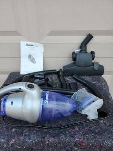 lot 217 image: Sonic Vac Ultra 800 Handheld Vacuum with Attachments - NEEDS NEW EXTENSION HOSE LARGE ATTACHMENTS WONT FIT AS IS.  SMALL ATTAChMENTS DO