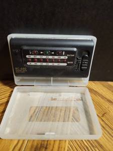 lot 317 image: BC-650 Electronic Guitar and Bass Auto Tuner with Instruction Manual